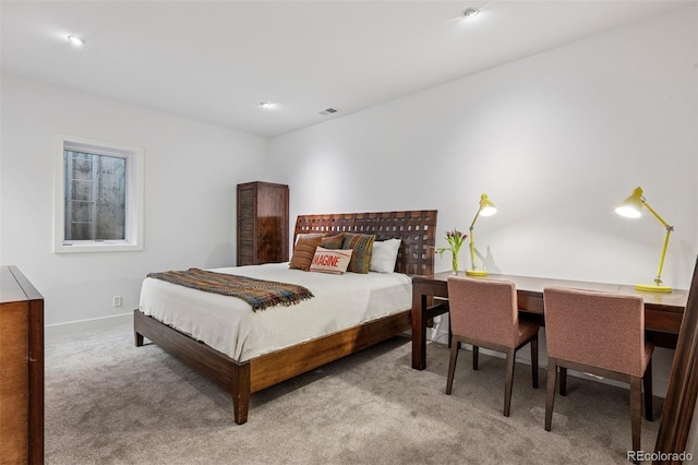 bedroom with carpet floors, baseboards, recessed lighting, and visible vents