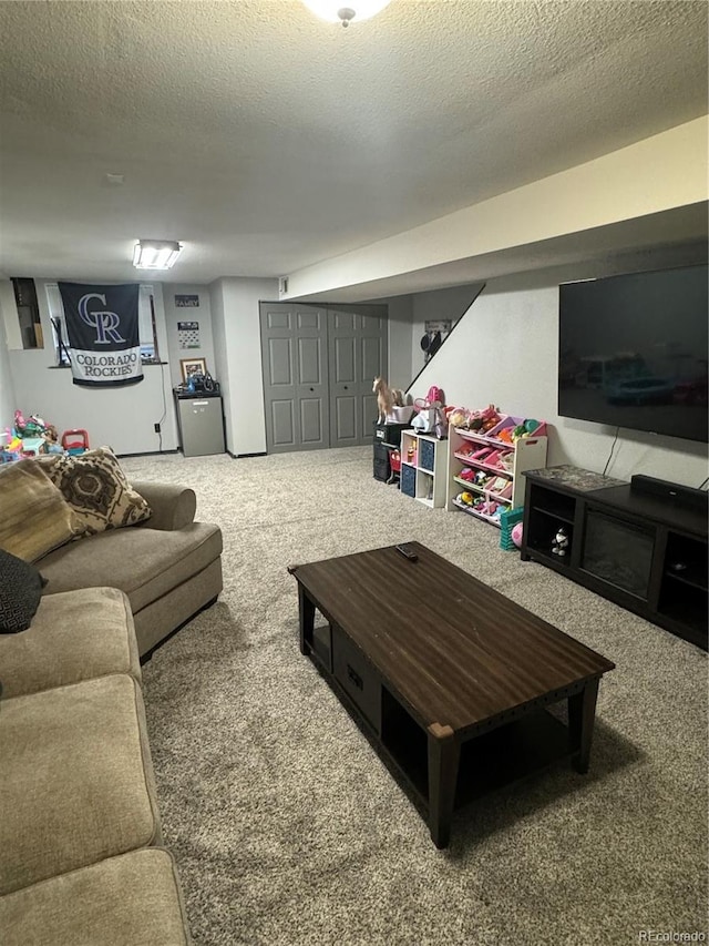 1254 S Reed St Unit 1, Lakewood, CO 80232 - living area with carpet flooring and a textured ceiling