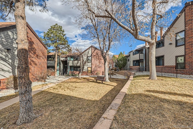 view of yard featuring a residential view