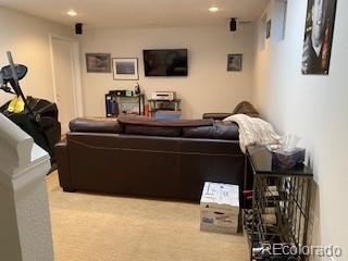 9060 E Cherry Creek S Drive E, Denver, CO 80231 - living area featuring recessed lighting and carpet flooring