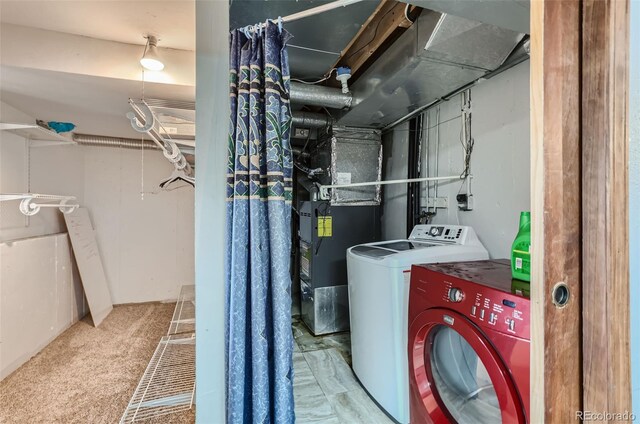 laundry area featuring washing machine and dryer