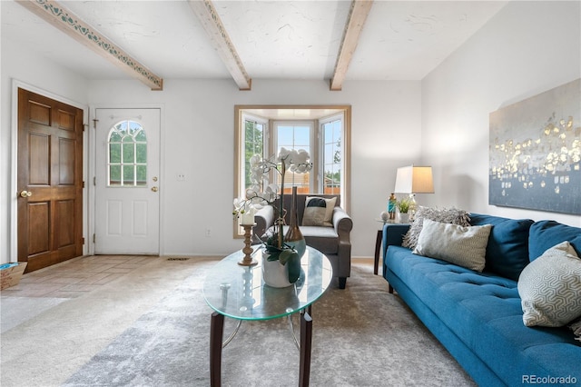 16308 E Wyoming Dr, Aurora, CO 80017 - carpeted living room featuring healthy amount of natural light and beam ceiling