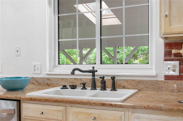 16308 E Wyoming Dr, Aurora, CO 80017 - kitchen featuring a sink, light countertops, and light brown cabinetry
