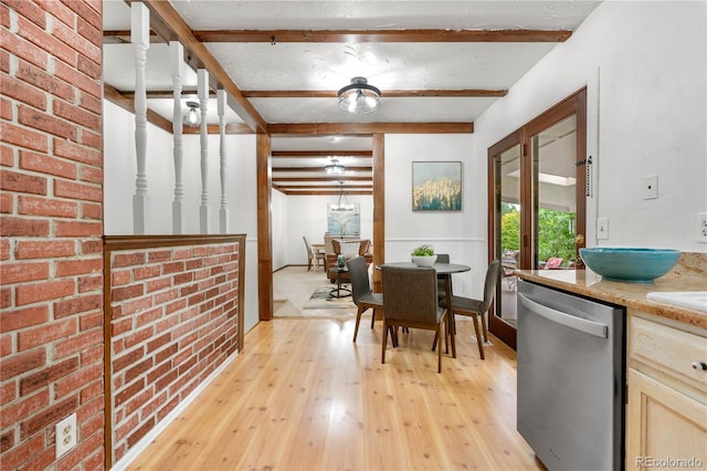 16308 E Wyoming Dr, Aurora, CO 80017 - dining space with beam ceiling and light wood-style floors