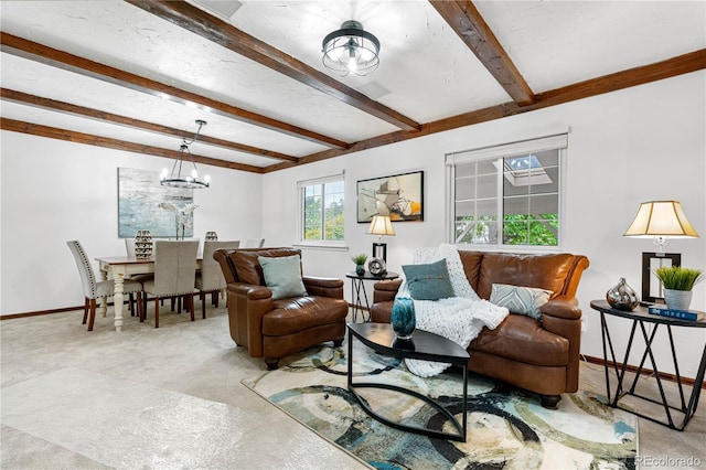 16308 E Wyoming Dr, Aurora, CO 80017 - living area with a chandelier, beamed ceiling, and baseboards