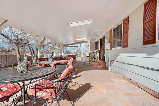 16308 E Wyoming Dr, Aurora, CO 80017 - view of patio / terrace featuring outdoor dining space