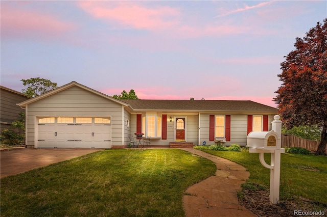 16308 E Wyoming Dr, Aurora, CO 80017 - ranch-style home with driveway and an attached garage