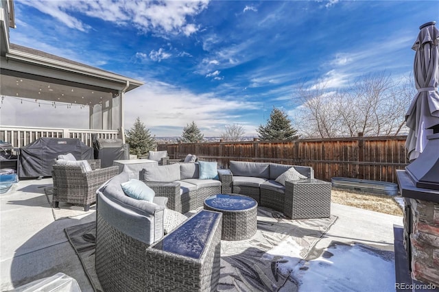 view of patio / terrace featuring area for grilling and outdoor lounge area