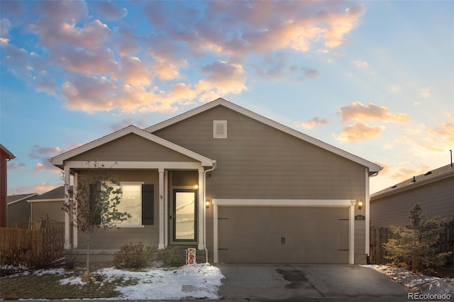 view of front of property featuring a garage