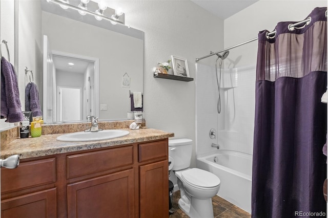 full bathroom with toilet, vanity, and shower / bath combo with shower curtain