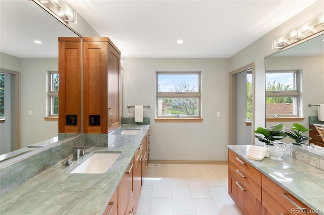 bathroom featuring vanity and plenty of natural light