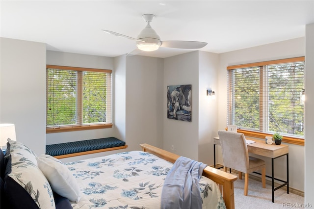 carpeted bedroom featuring ceiling fan