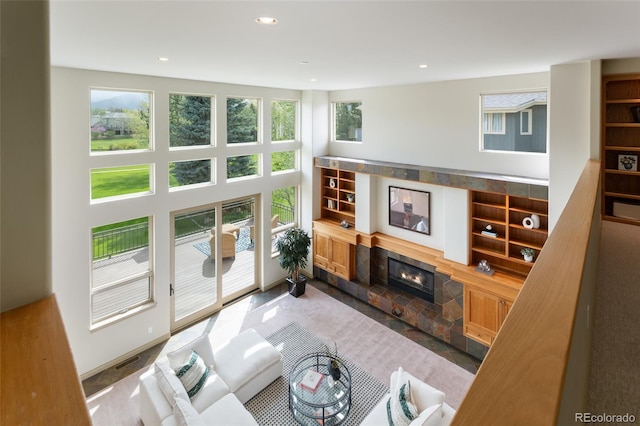 living room featuring a high ceiling