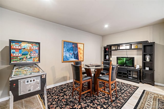 dining space with light hardwood / wood-style floors