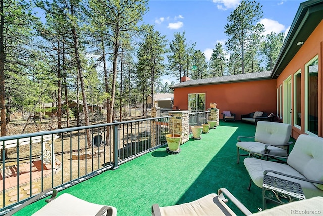 view of terrace with a balcony