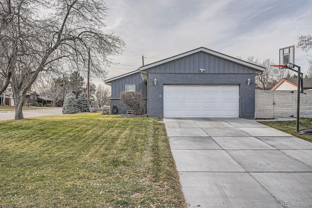 view of front of home with driveway, an attached garage, a front yard, board and batten siding, and brick siding