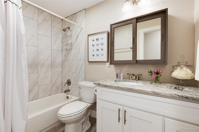 full bath featuring toilet, wood finished floors, vanity, and shower / tub combo with curtain