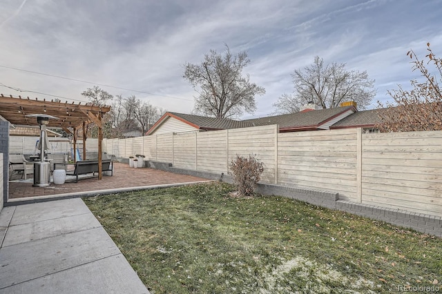 view of yard with a patio, a fenced backyard, and a pergola