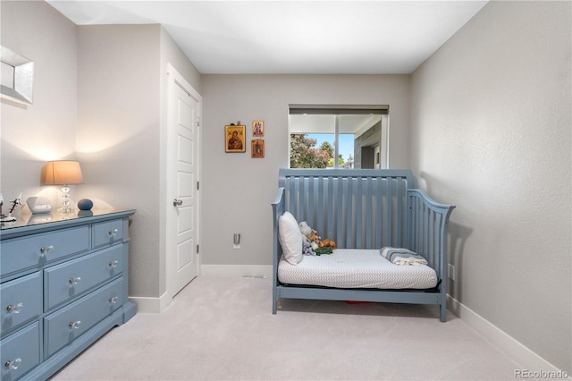 7155 E Exposition Ave, Denver, CO 80224 - bedroom featuring light colored carpet and baseboards