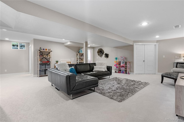 7155 E Exposition Ave, Denver, CO 80224 - living room featuring carpet and recessed lighting