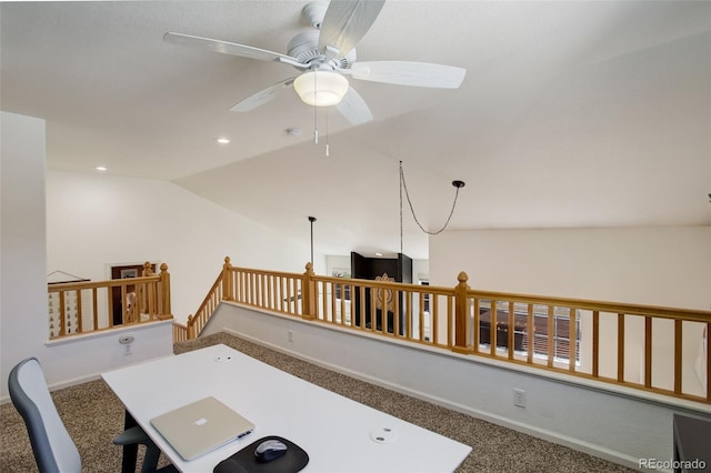 office with ceiling fan, baseboards, carpet, and lofted ceiling