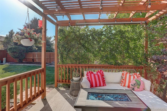 view of patio / terrace with an outdoor fire pit, a pergola, and fence