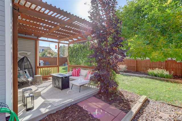 view of patio with a deck, a fenced backyard, a pergola, and a fire pit