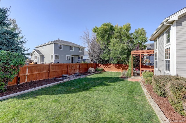 view of yard featuring a fenced backyard and a pergola