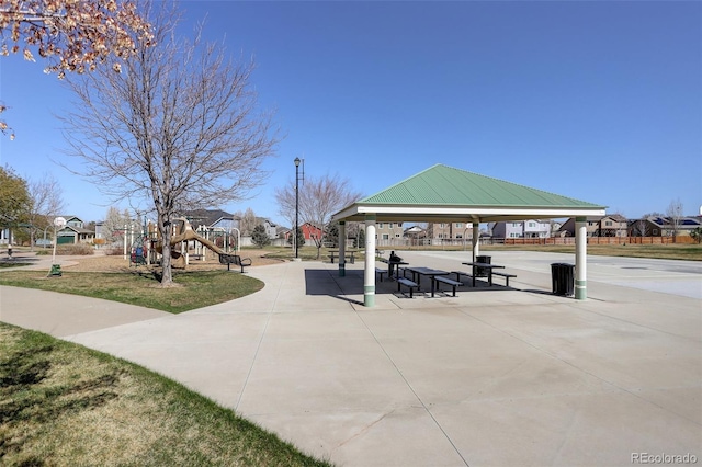 surrounding community with a gazebo, playground community, and a residential view