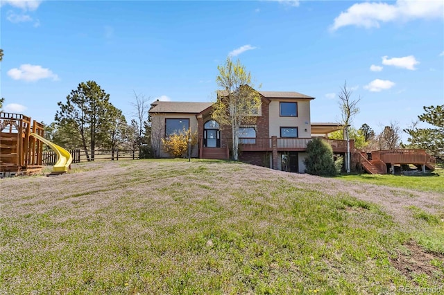 view of front of home with a wooden deck