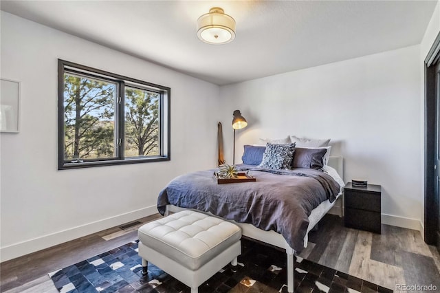 7388 S Ireland Cir, Centennial, CO 80016 - bedroom with baseboards and wood finished floors