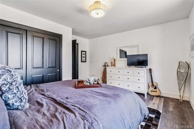 7388 S Ireland Cir, Centennial, CO 80016 - bedroom with dark wood-type flooring and baseboards