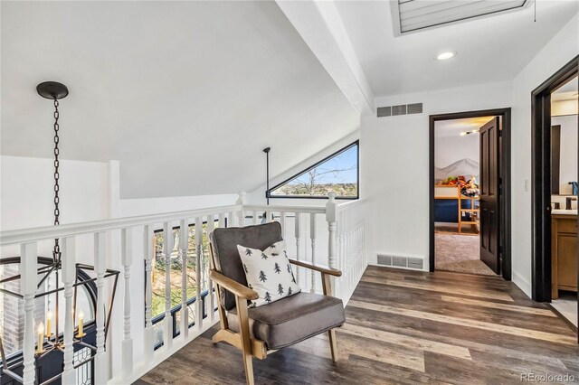7388 S Ireland Cir, Centennial, CO 80016 - living area with wood finished floors, lofted ceiling, and recessed lighting