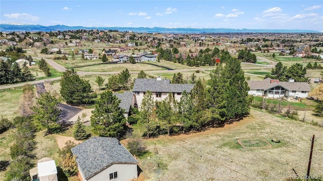 7388 S Ireland Cir, Centennial, CO 80016 - aerial perspective of suburban area featuring a mountainous background