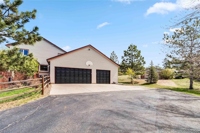7388 S Ireland Cir, Centennial, CO 80016 - garage with asphalt driveway