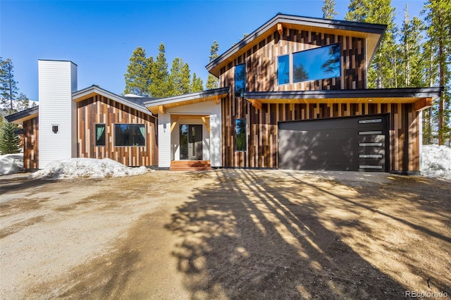 209 American Way, Breckenridge, CO 80424 - contemporary home with driveway and an attached garage