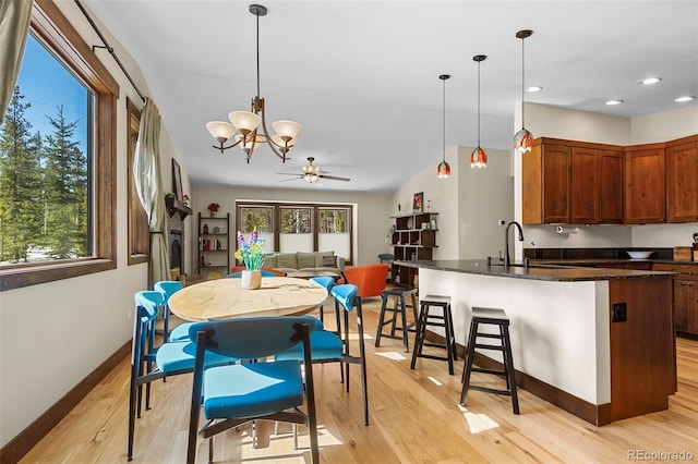 209 American Way, Breckenridge, CO 80424 - dining space with a chandelier, light wood-style flooring, and recessed lighting