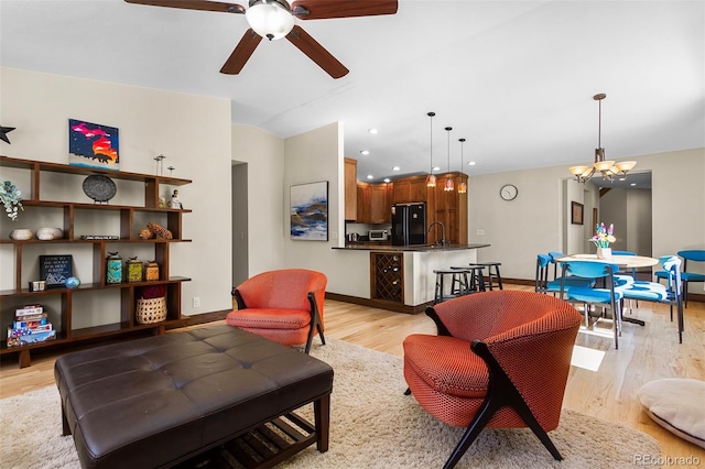 209 American Way, Breckenridge, CO 80424 - living area featuring light wood-type flooring, ceiling fan, a chandelier, lofted ceiling, and recessed lighting