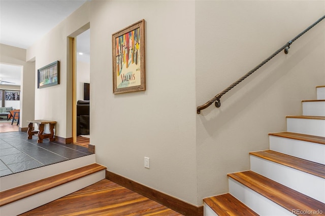 209 American Way, Breckenridge, CO 80424 - stairway featuring baseboards and wood finished floors
