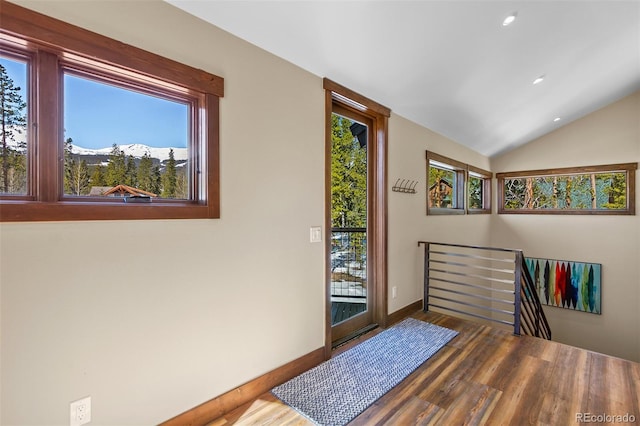 209 American Way, Breckenridge, CO 80424 - bedroom featuring access to outside, wood finished floors, vaulted ceiling, recessed lighting, and a mountain view