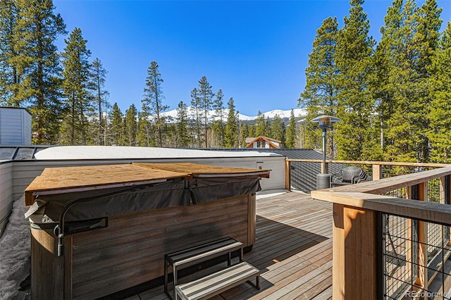 209 American Way, Breckenridge, CO 80424 - deck featuring a hot tub and a mountain view