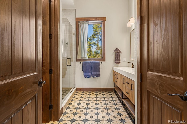 209 American Way, Breckenridge, CO 80424 - bathroom with vanity, tile patterned floors, and a stall shower