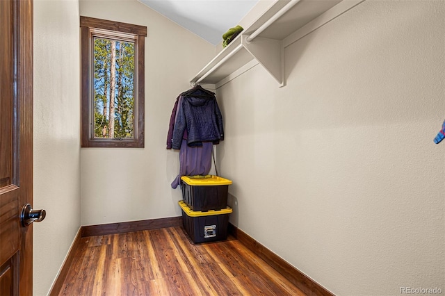 209 American Way, Breckenridge, CO 80424 - walk in closet featuring dark wood-style floors and vaulted ceiling