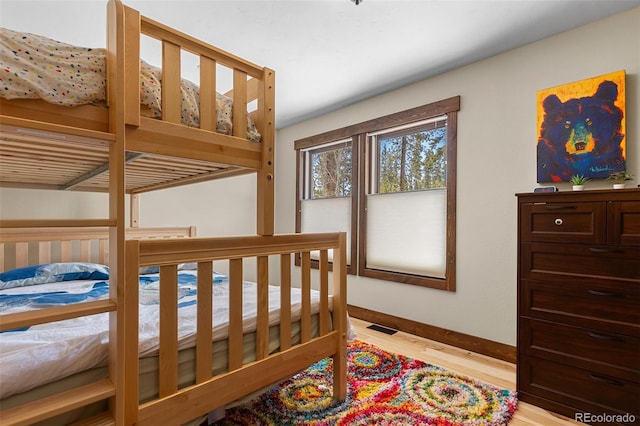 209 American Way, Breckenridge, CO 80424 - bedroom with light wood-style floors and baseboards