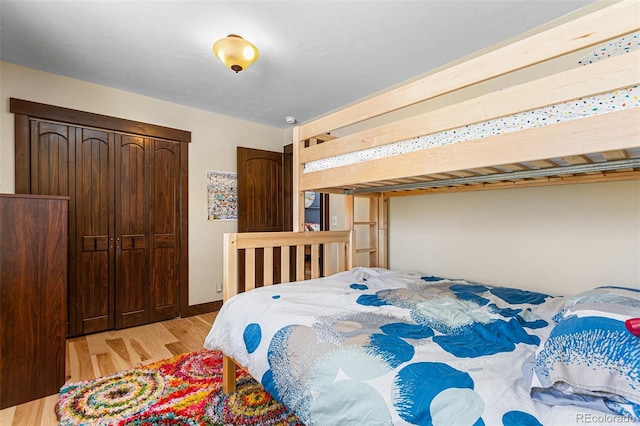 209 American Way, Breckenridge, CO 80424 - bedroom with wood finished floors and baseboards