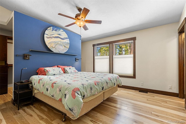 209 American Way, Breckenridge, CO 80424 - bedroom with wood finished floors and a ceiling fan