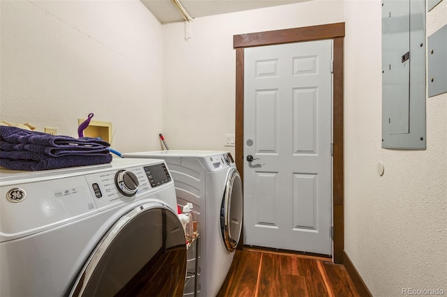 209 American Way, Breckenridge, CO 80424 - washroom with electric panel, washing machine and clothes dryer, and dark wood finished floors