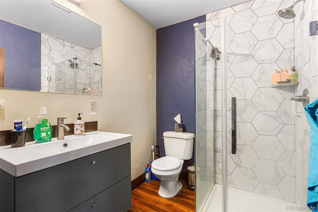 209 American Way, Breckenridge, CO 80424 - full bath with wood finished floors, vanity, and a stall shower