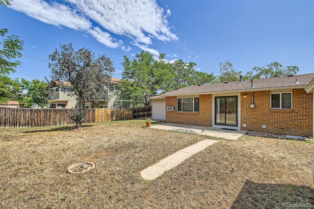 rear view of property with a patio