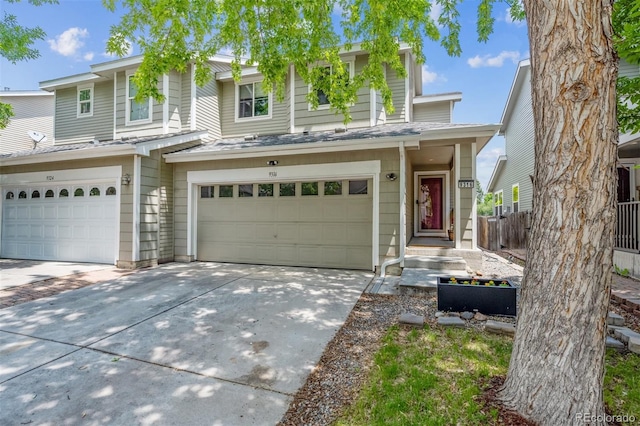 9316 Harrison St, Thornton, CO 80229 - view of property featuring a garage, concrete driveway, and roof with shingles